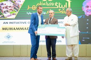 Prime Minister Muhammad Shehbaz Sharif distributes PM Apna Ghar Program cheques among the beneficiaries.