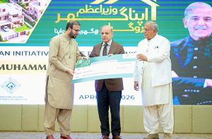Prime Minister Muhammad Shehbaz Sharif distributes PM Apna Ghar Program cheques among the beneficiaries.