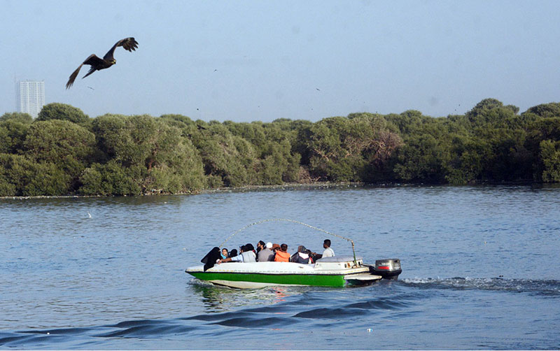 People enjoy boat ride near Native Jetty along the Arabian Sea