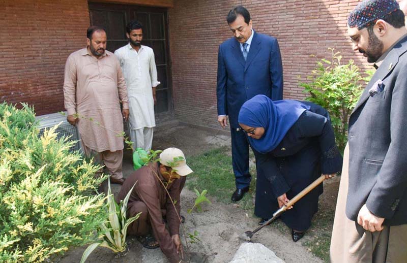 Chairman Senate, Syed Yousuf Raza Gillani along with H.E. Harerimανα Fatou, High Commissioner of the Republic of Rwanda planted a sapling at Gilani house
