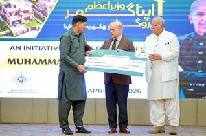Prime Minister Muhammad Shehbaz Sharif distributes PM Apna Ghar Program cheques among the beneficiaries.
