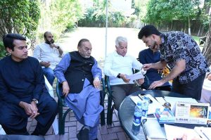 Defense Minister Khawaja Muhammad Asif listens to public concerns at his residence in Cantt