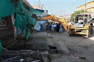 Illegal encroachments are being removed from Miro Khan Chowk to New Bus Stand Road under the supervision of Assistant Commissioner Larkana, Raja Darya Khan Qureshi, during an anti-encroachment operation.