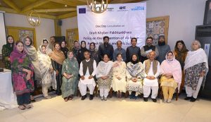 Additional Secretary Social Welfare Department Umra Khan, Resident Director of Aurat Foundation Shabina Ayaz and UN Women members in a group photo along with other participants during one day consultation on Draft KP Policy on the Prevention of Violence against Women and Girls 2026
