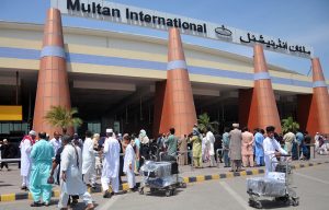 Relatives gathered outside Multan International Airport to see off Hajj pilgrims on the first Hajj flight