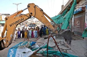 Illegal encroachments are being removed from Miro Khan Chowk to New Bus Stand Road under the supervision of Assistant Commissioner Larkana, Raja Darya Khan Qureshi, during an anti-encroachment operation.