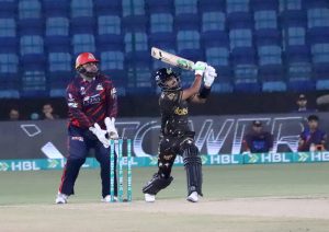- Islamabad United Devon Conway plays a shot during the Pakistan Super League -11 cricket match against Lahore Qalandars at national Stadium.