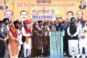 Thousands of Indian Sikh pilgrims (yatrees) arrive at Wagah Border to attend the Vaisakhi Mela and celebrate the 327th birth anniversary of the Khalsa