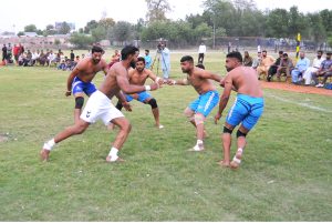 Players in action during Pakistan Railway Multan Division Kabaddi Exhibition Match playing between Multan Division and Lahore Division at Railway Ground.