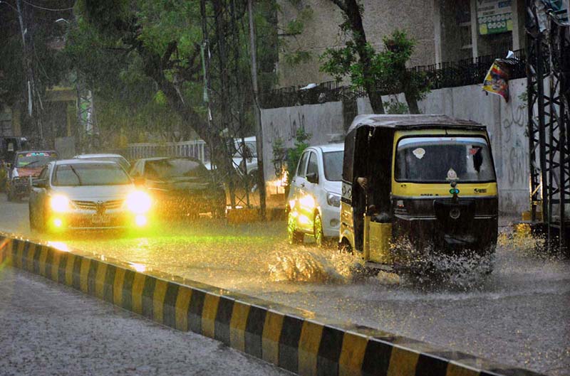 Commuters facing heavy rain in the city