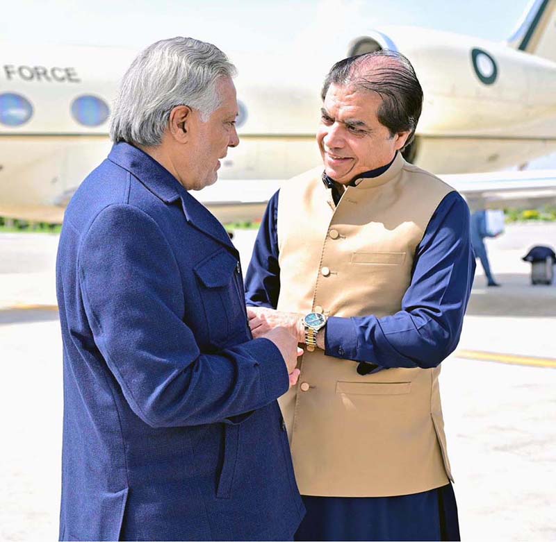 Federal Minister for Railways Muhammad Hanif Abbasi warmly receives Deputy Prime Minister and Foreign Minister Ishaq Dar upon his return from China, congratulating him on successful diplomatic engagements, a productive China visit, and the successful completion of the trilateral Foreign Ministers' Conference
