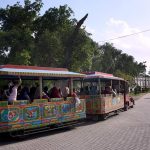 People enjoying a tram ride at Greater Iqbal Park