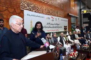 Defense Minister Khawaja Muhammad Asif, addresses the farewell ceremony of the first Hajj flight from Sialkot Airport