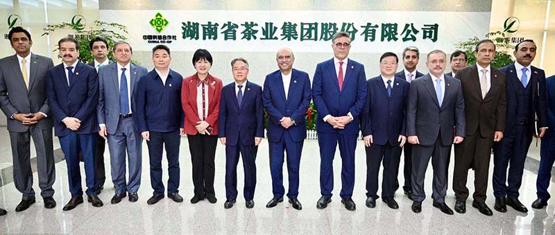 President Asif Ali Zardari in a group photograph at the Hunan Tea Group