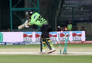 Lahore Qalandars’ Fakhar Zaman bold out by Quetta Gladiators Alzarri Joseph during the Pakistan Super League -11 cricket match at National Stadium.