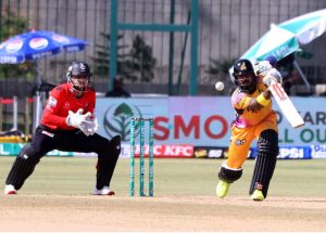 Peshawar Zalmi batter Kusal Mendis plays a shot during the Pakistan Super League T20 cricket match between Lahore Qalandars and Peshawar Zalmi at National Stadium