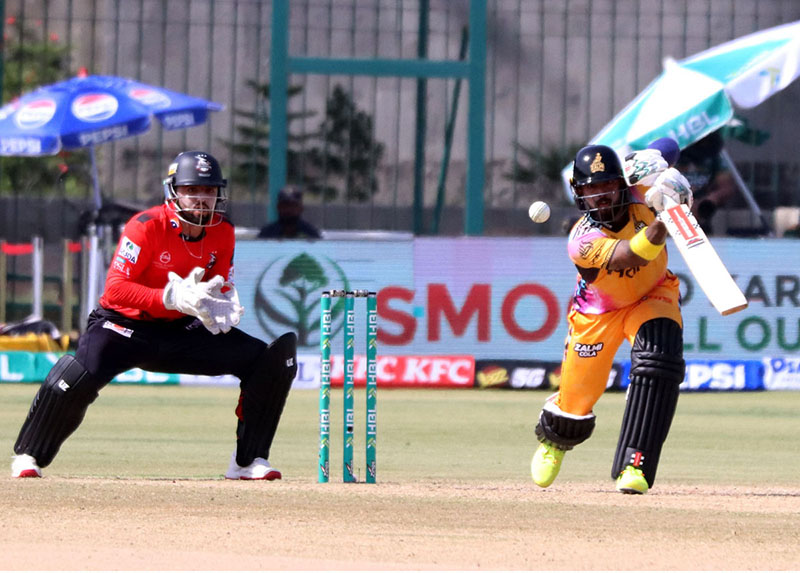 Peshawar Zalmi batter Kusal Mendis plays a shot during the Pakistan Super League T20 cricket match between Lahore Qalandars and Peshawar Zalmi at National Stadium