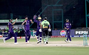 Lahore Qalandars’ Fakhar Zaman bold out by Quetta Gladiators Alzarri Joseph during the Pakistan Super League -11 cricket match at National Stadium.