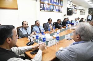 Federal Minister for Maritime Affairs Muhammad Junaid Anwar Chaudhry talking to Rice Exporters Association of Pakistan members in Karachi.