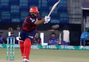Peshawar Zalmi batter Kusal Mendis plays a shot during the Pakistan Super League T20 cricket match between Lahore Qalandars and Peshawar Zalmi at National Stadium