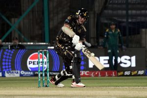 Peshawar Zalmi Batter Babar Azam plays a shot during the Pakistan Super League (PSL 11) match between Peshawar Zalmi and Multan Sultans at National Bank Stadium