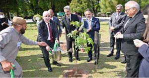 Hon'ble Mr. Kadir Özkaya, President Constitutional Court of the Republic of Türkiye planting a tree in Supreme Court Garden at.