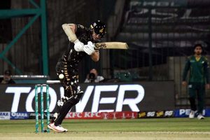 Peshawar Zalmi Batter Babar Azam plays a shot during the Pakistan Super League (PSL 11) match between Peshawar Zalmi and Multan Sultans at National Bank Stadium