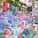 A vendor displaying different plastic items to attract the customers at I/9 Bazaar in Federal Capital