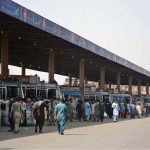 A large number of people arrive at the General Bus Stand to leave for their hometowns to celebrate Eidul Azha with their loved ones