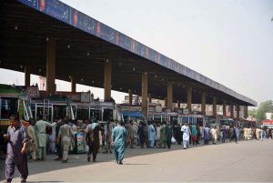A large number of people arrive at the General Bus Stand to leave for their hometowns to celebrate Eidul Azha with their loved ones