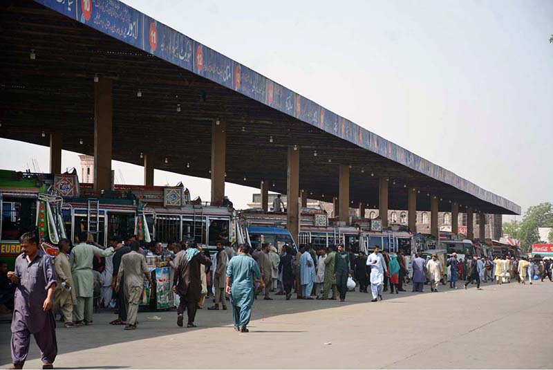 A large number of people arrive at the General Bus Stand to leave for their hometowns to celebrate Eidul Azha with their loved ones