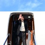 President Asif Ali Zardari waves goodbye to Mr. Wang Qiyang, Party Secretary of the CPC Hainan, from the doorway of the aircraft before departing Sanya Airport