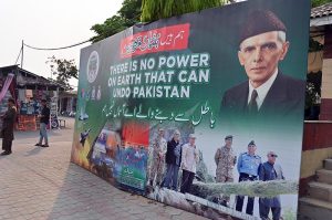 A huge banner is displayed to mark the anniversary of the victory of Bunyan-un-Marsoos at the weekly H-9 Bazaar in the Federal Capital