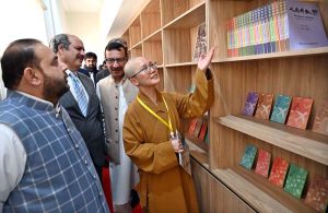 Vice Chancellor Quaid-e-Azam University, Zafar Nawaz Jaspal cutting ribbon to inaugurate the Humanistic Buddhism Research Centre.