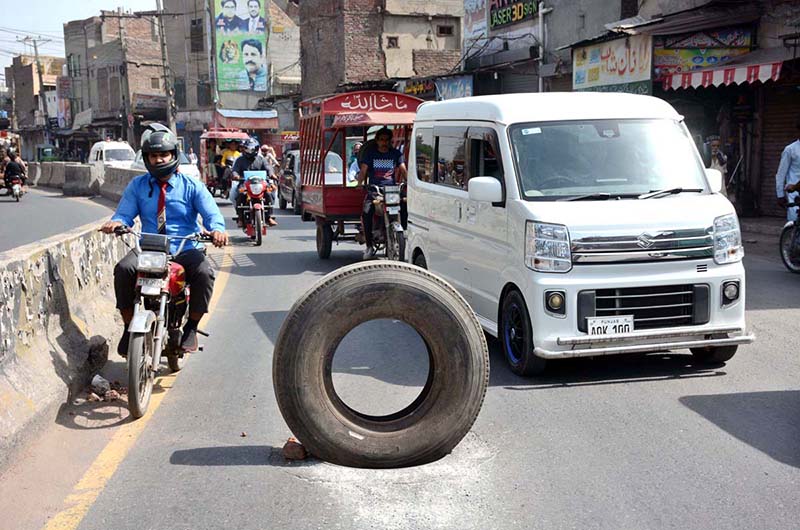 A view of an open manhole on main Sargodha Road near General Bus Stand may cause any mishap to needs the attention of the concerned authority