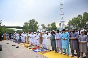Federal Minister for Railways Muhammad Hanif Abbasi offering Eidul Azha prayers at Eidgah Sharif
