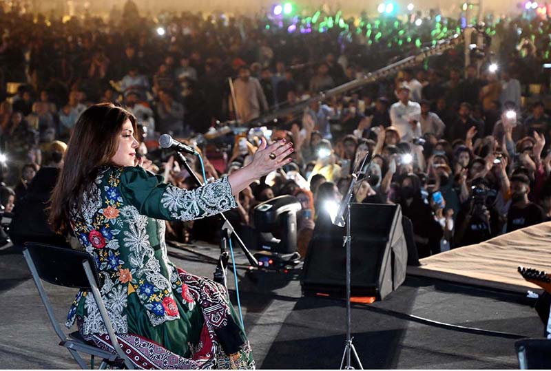 Singer Hadiqa Kiani performing on the stage during Musical Night celebrations of the one-year completion of the Marka e Haq Bunyan un Marsoos, organized by Former Sindh Home Minister, MPA Sardar Sohail Anwar Khan Siyal at PTS Ground