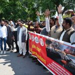 Workers from different walk of life participate in a rally organized by workers union of deferent institutions on the eve of World Workers Day observing all over the world