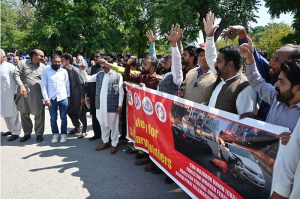 Workers from different walk of life participate in a rally organized by workers union of deferent institutions on the eve of World Workers Day observing all over the world
