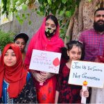 People from different organizations along with children suffering from thalassemia participate in a walk organized by Fatimid Foundation on the eve of World Thalassemia Day at Press Club Road