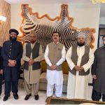 Chairman Senate Syed Yousaf Raza Gilani in a group photograph with Former Chairman Ruet-E-Hilal Committee Mufti Muneeb Ur Rehman, Pir Hassan Haseeb Shah of Eidgah Sharif, and members of the visiting delegation during a meeting at his residence