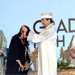 Chairman Senate Syed Yousaf Raza Gilani presents medals to graduating students during a convocation ceremony at The University of Lahore