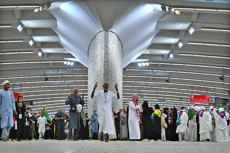 Pilgrims perform the ritual of Rami Al-Jamarat at the Jamarat Complex in Mina on the second day of Tashreeq as they continue the final rites of Hajj 1447 AH amid extensive security and crowd management arrangements in Mina, Saudi Arabia