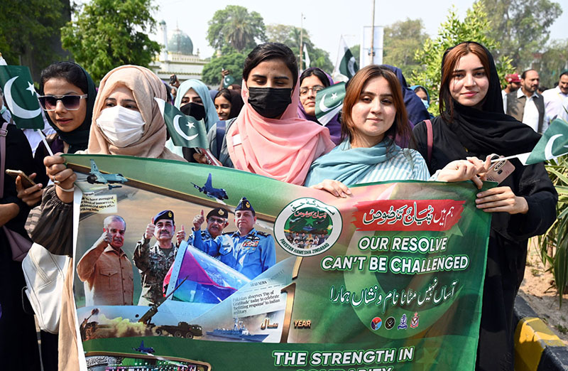 Students participate in a rally on jashn e Marka-e-Haq and Bunyan-ul-Marsoos at University of Sargodha