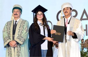Chairman Senate Syed Yousaf Raza Gilani presents medals to graduating students during a convocation ceremony at The University of Lahore