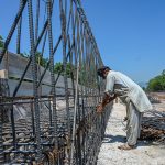 Workers on their routine development work at Park Road while World Workers Day is observing all over the world