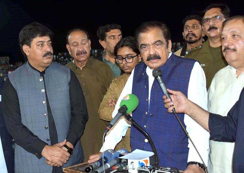 Adviser to Prime Minister (PM) on Political and Public Affairs Senator Rana Sanaullah Khan is addressing a public gathering during inauguration of sui-gas supply at International Kabaddi Stadium Chak No.3-JB Ramdewali