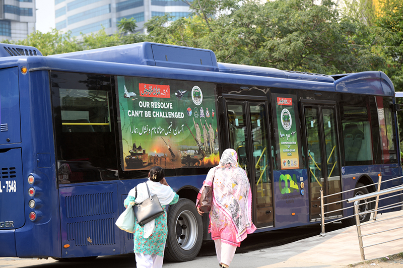 Posters displayed on electric buses in the federal Capital to mark the completion of one year of the victory of Marka-e-Haq Bunyan-ul-Marsoos