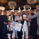 Chairman Punjab Higher Education Commission (PHEC) Prof Dr Iqrar Ahmad Khan along with Vice Chancellor (VC) University of Agriculture Faisalabad (UAF) Prof Dr Zulfiqar Ali is giving away first prize along with trophy to winner of beautiful goat competition during 28th International Festival 2026 at UAF on late Saturday night