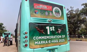 Posters displayed on electric buses in the federal Capital to mark the completion of one year of the victory of Marka-e-Haq Bunyan-ul-Marsoos